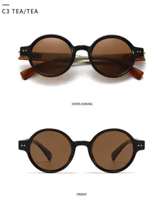 Vue détaillée de lunettes de soleil polarisées rondes vintage en marron thé C3 design classique.