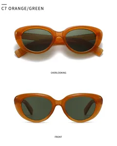 Detailed view of trendy cat-eye sunglasses in orange frame with green lenses. 859