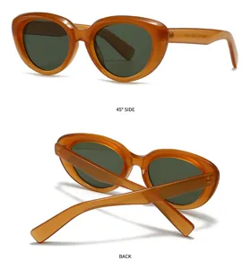 Amber cat eye sunglasses detail view, trendy acetate frame with dark green lenses, stylish eyewear.