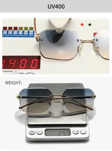 Lunettes de soleil sans monture pour femme, verres dégradés, branches dorées et UV400.