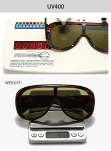 Detailed shot of oversized tortoise shell shield sunglasses showing UV400 test and weight.