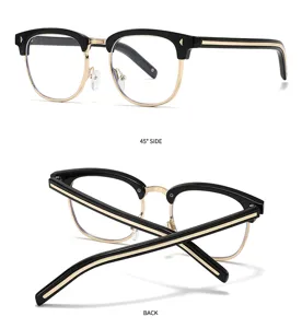 Retro half-frame browline glasses detail view, black and gold design, stylish eyewear.