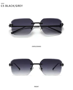Lunettes de soleil carrées sans monture avec verres dégradés et décors en métal.