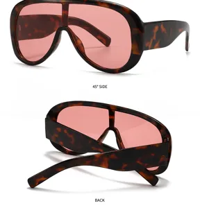 Oversized shield sunglasses featuring a tortoise shell frame and stylish pink tinted lenses.