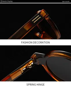Détails en gros plan de lunettes de soleil rondes ambrées avec charnière à ressort.