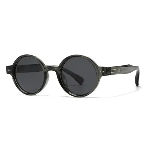 Lunettes de soleil polarisées rondes classiques pour hommes et femmes avec monture grise.