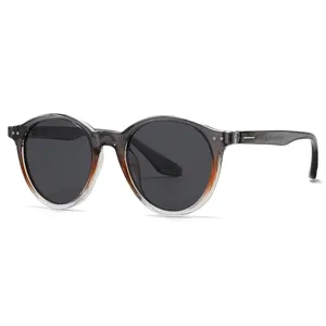 Lunettes de soleil rondes polarisées pour hommes et femmes avec monture dégradée et protection UV.