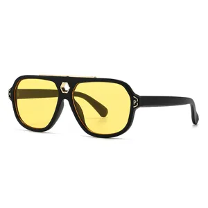 Retro Sonnenbrille mit dickem Rahmen für Damen und Herren, gelben Gläsern und Metallsteg.