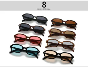 Gafas de sol ovales retro en detalle con múltiples lentes coloridas y detalles metálicos.
