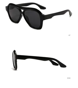 Lunettes de soleil aviateur noires classiques à double pont en détail, style rétro.