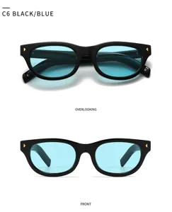 Chique retro zwarte zonnebril met blauwe lenzen, stijlvolle UV-bescherming voor dames.