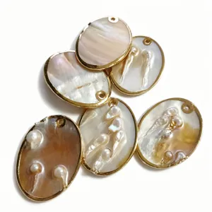 Natural pearl shell oval charms with gold plated edges, perfect for DIY jewelry making and crafts.