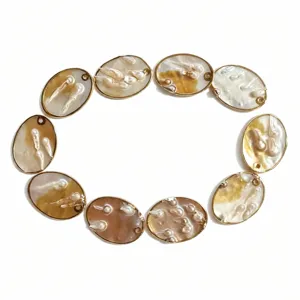 Natural MOP oval shell pearl bezel components detail shot for handmade DIY jewelry crafting.