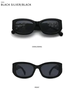 Vintage Barock Stil schwarze Sonnenbrille mit klobigem Rahmen und Metallring Details.