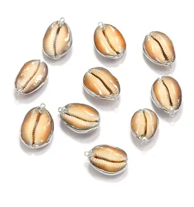 Detailed view of electroplated silver rim shell pendant, DIY jewelry accessory charm.