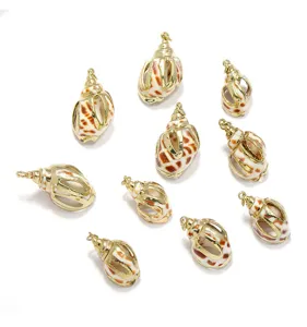 Gold electroplated cut babylon shell charms with gold rim jewelry making components.