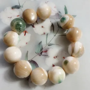 Detail view of natural green shell round beads, 20-23mm large size DIY jewelry making parts.