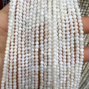 Detailed view of white freshwater shell round bead strands, 3-6mm DIY jewelry making accessories.