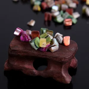 Colorful irregular freshwater shell beads for DIY jewelry making, bracelets, and necklaces.