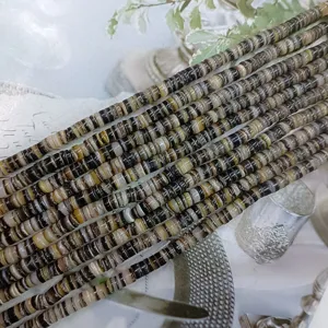 Natural shell spacer beads, black-lip oyster irregular round discs for DIY jewelry making.