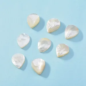 Mother of pearl shell teardrop DIY pieces detail view, natural lustrous jewelry components