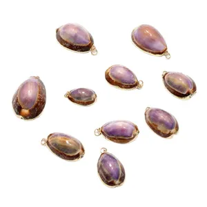 Pendentifs en coquillage de style marin avec bordure dorée pour creation de bijoux DIY.