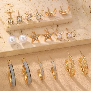 Gold-toned fashion earrings set featuring rhinestone, pearl, star, moon and hoop designs.