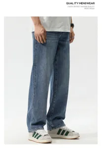 Detail view of men's retro loose straight-leg blue denim jeans for spring fashion