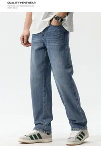 Detail view of men's loose straight-leg vintage blue denim jeans for casual wear