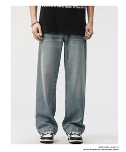 Detailed view of vintage washed loose straight-leg denim jeans for men's street fashion.