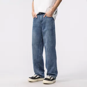 Men's loose straight-leg denim jeans in a vintage washed blue American streetwear style