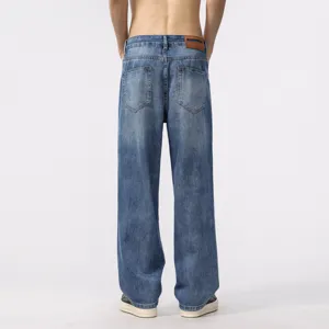 Back view of men's loose straight-leg denim jeans in vintage blue wash, casual style