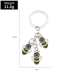 Alloy oil dripping bee metal keychain pendant detailed view showing 9.3cm size and weight.