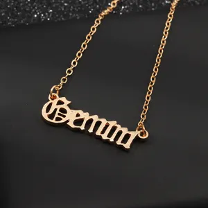 Detailansicht der goldenen Gemini Sternzeichen Buchstaben Anhänger Halskette, schick.