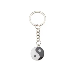 Metal Yin Yang keychain pendant with drip oil finish, classic black and white style accessory.