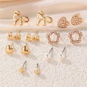 Elegantes mehrteiliges Perlen- und Gold-Ohrring-Set mit Schleife fuer Damen Alltag
