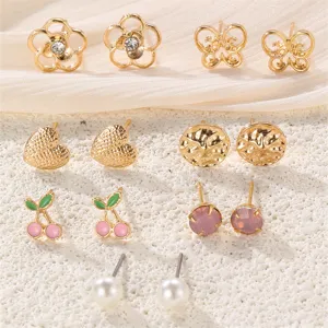 Schickes goldfarbenes Ohrstecker Set mit Blumen Schmetterlingen Perlen und Kirsch-Motiven.