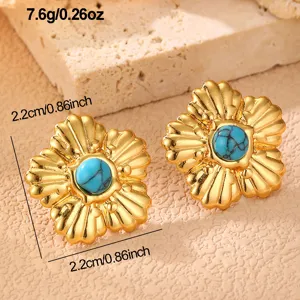 Goldene Blumen Ohrstecker mit türkisem Stein, elegante Schmuckstücke aus Edelstahl.