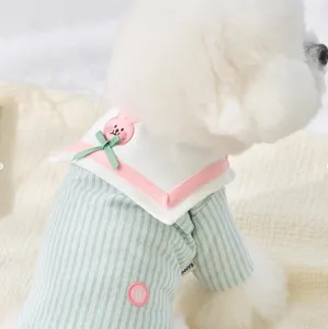 Cute striped pet shirt detail showing sailor collar, bunny embroidery and green ribbon bow.