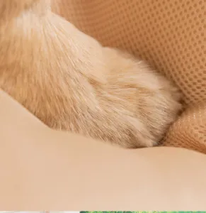 Close-up detail of breathable pet bed fabric and soft plush texture for comfortable dog sleep.