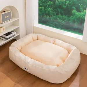 Waterproof four-season dog bed mat for medium and large dogs, breathable beige pet sleeping nest.