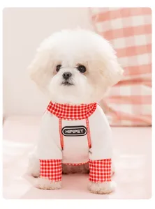 Detailed view of breathable spring summer pet dog four leg clothing with cute red plaid collar.