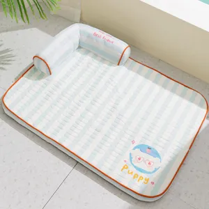 Pet cooling mat detail view, blue white stripe dog bed with soft pillow for summer comfort.