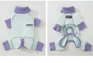 Pet four-leg clothing spring summer thin breathable mint green dog jumpsuit with purple collar.