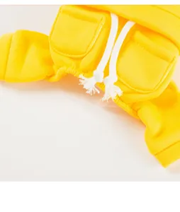 Yellow pet hoodie detail view showing adjustable white drawstrings and soft fleece fabric.