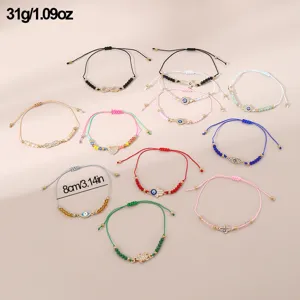 Modisches geflochtenes Perlenarmband Set mit Schutzauge Anhängern für moderne Damen.