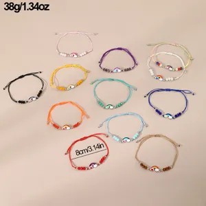 Buntes geflochtenes Perlenarmband Set mit süßen Regenbogen und Herz Anhängern, verstellbar.