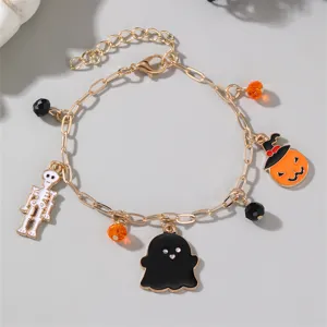 Bracciale charms Halloween con ciondoli di fantasma, zucca e scheletro, gioielli color oro.