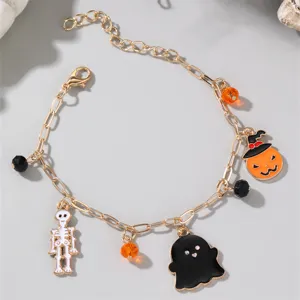 Bracciale con ciondoli di Halloween con zucca fantasma e scheletro, catena in metallo dorato.