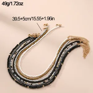Detailed view of bohemian style multi-strand beaded necklace set with adjustable chain design.